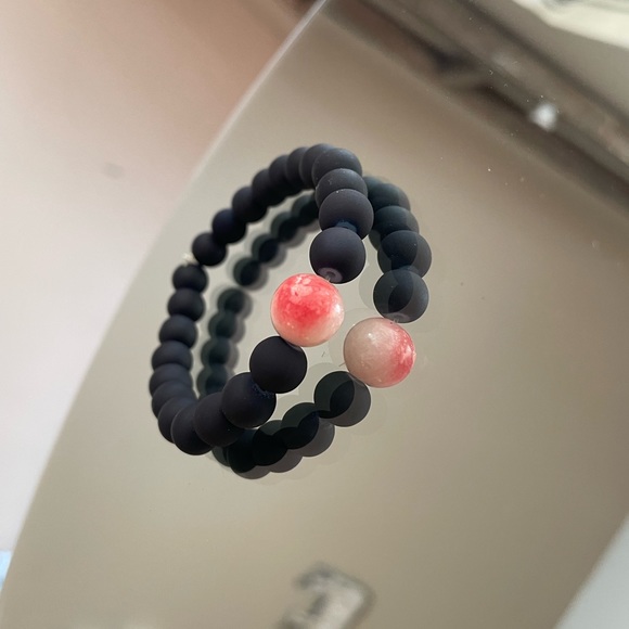 Beautiful Navy beaded bracelet with peach accent bead